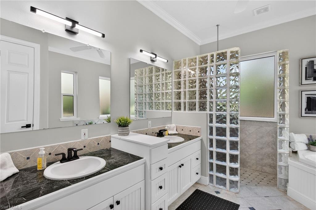 Dual sinks, walk in shower, and soaker tub!