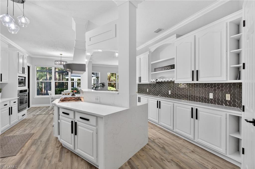 Stunning kitchen, lighting, backsplash!