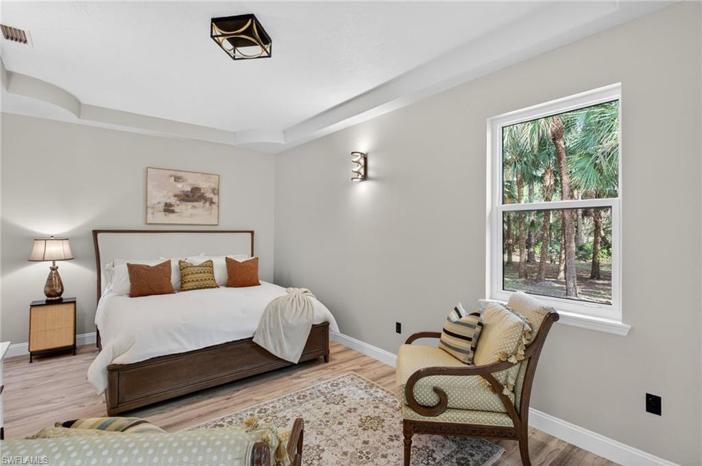Bedroom #5 located on the north wing of the house. Separate and was previously used as a theater room.