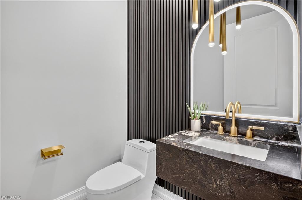 Bathroom with vanity and toilet