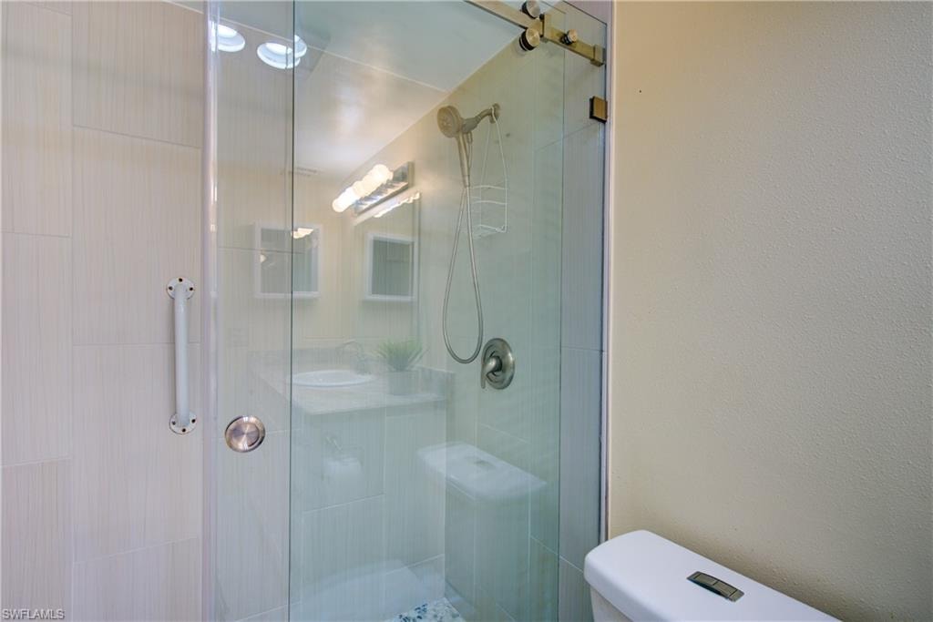 Full bath featuring a stall shower