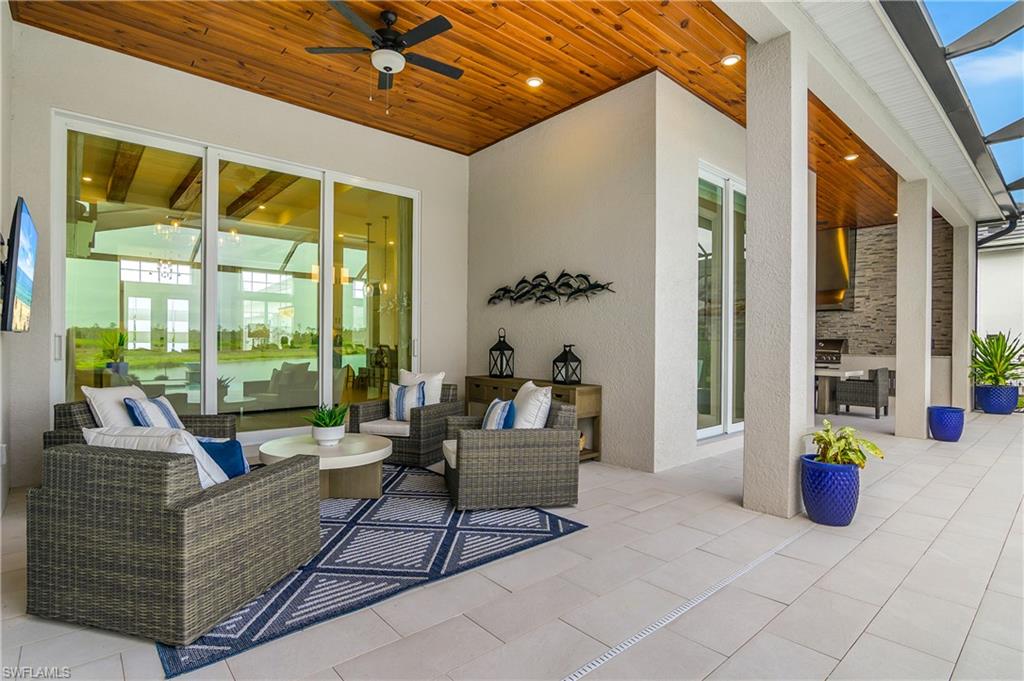 View of patio / terrace with outdoor furniture and ceiling fan