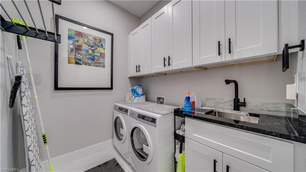 Laundry area with cabinetry
