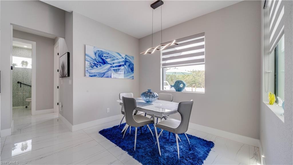 Spacious dining area with room for extended table.