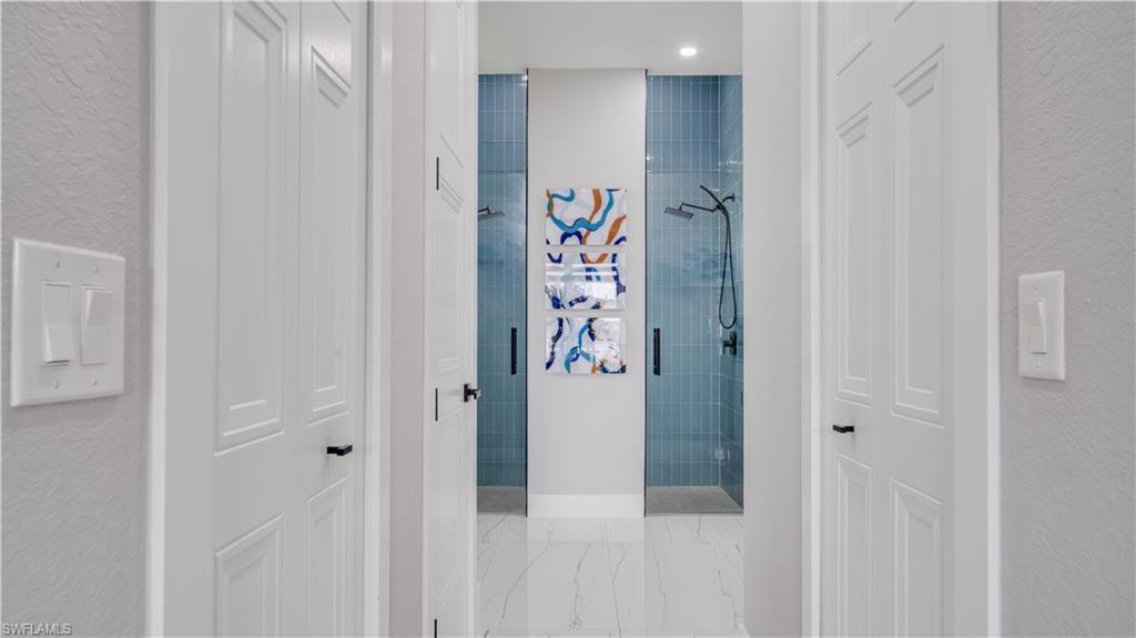 Primary Bathroom featuring 2 huge walk in closets and a private water closet