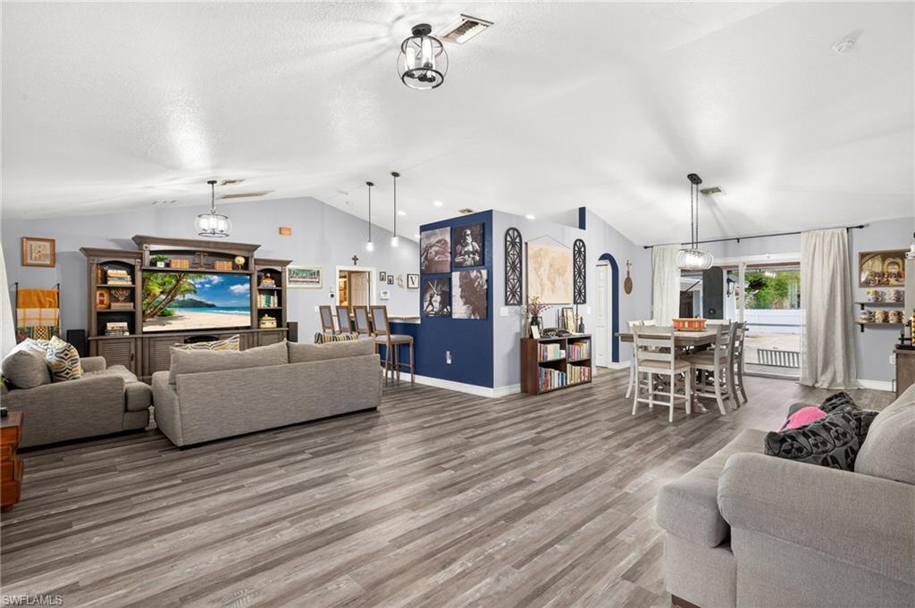 Living area featuring wood finished floors and baseboards