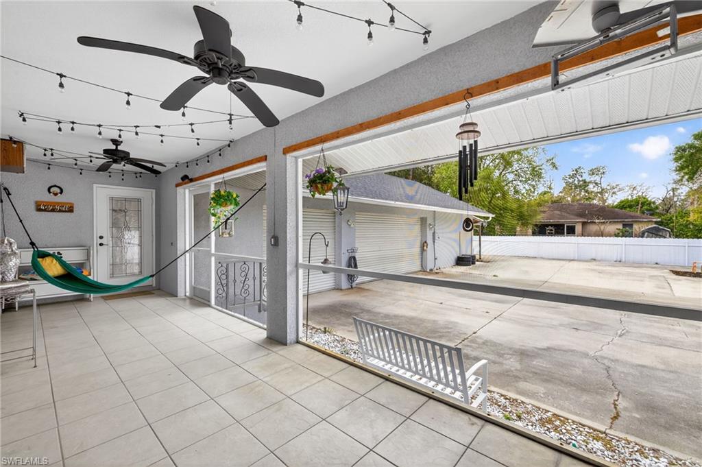 View of patio featuring a ceiling fan
