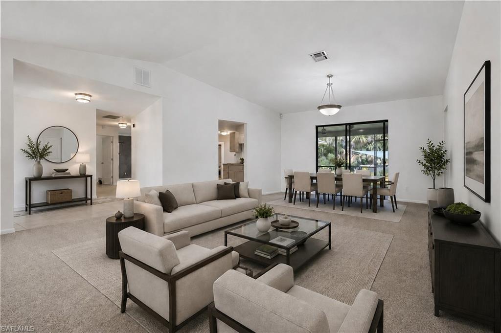 Virtually staged formal living and dining area