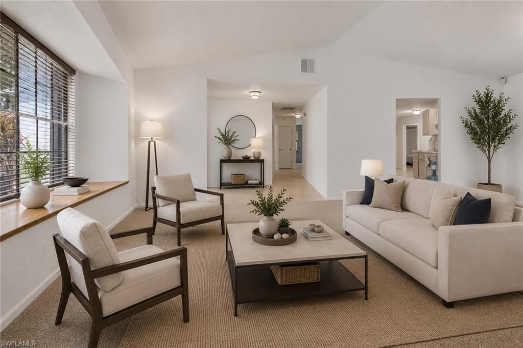 Virtually staged formal living area