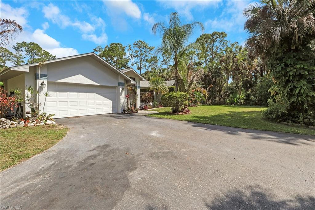 Beautiful home nestled on 2.34 acres, offering exceptional privacy and lush landscaping throughout—providing the freedom to truly make it your own