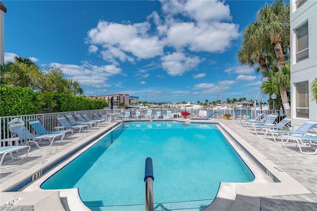 Community pool featuring a patio area