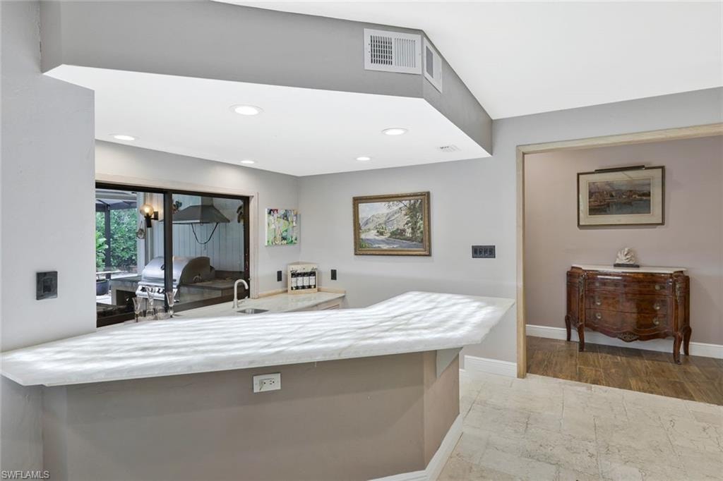 Bar area adjacent to pool and great room