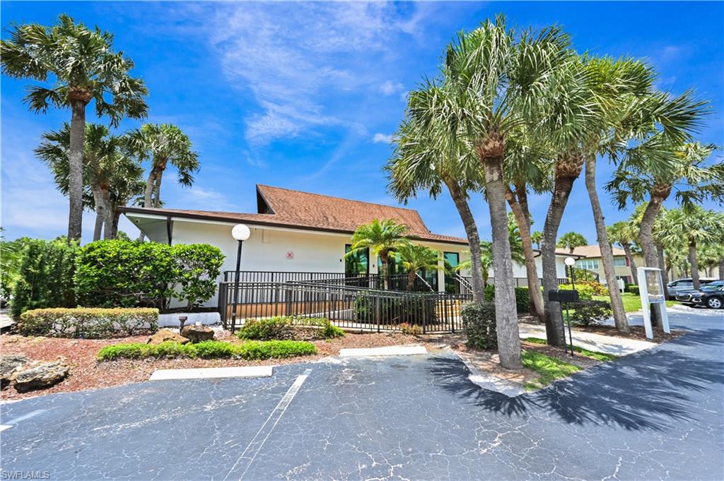 Ranch-style home featuring a fenced front yard, uncovered parking, and stucco siding