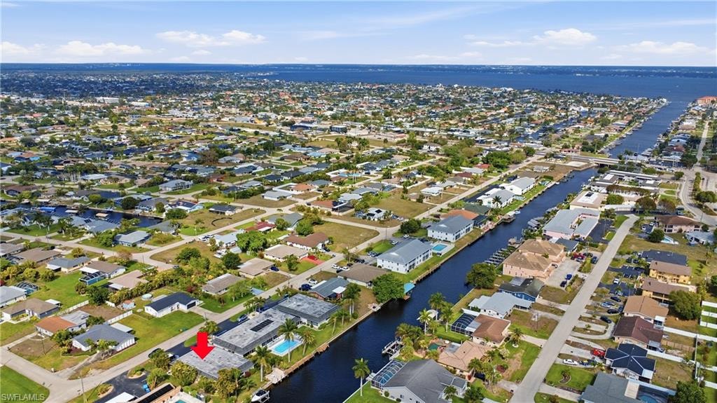 Aerial perspective of suburban area with views of the Caloosahatchee River