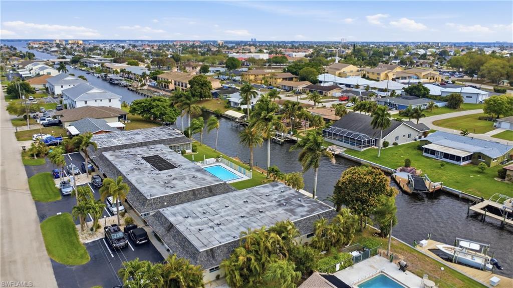 Aerial view of residential area with a large body of water