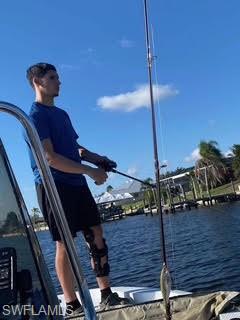 Dock featuring a water view