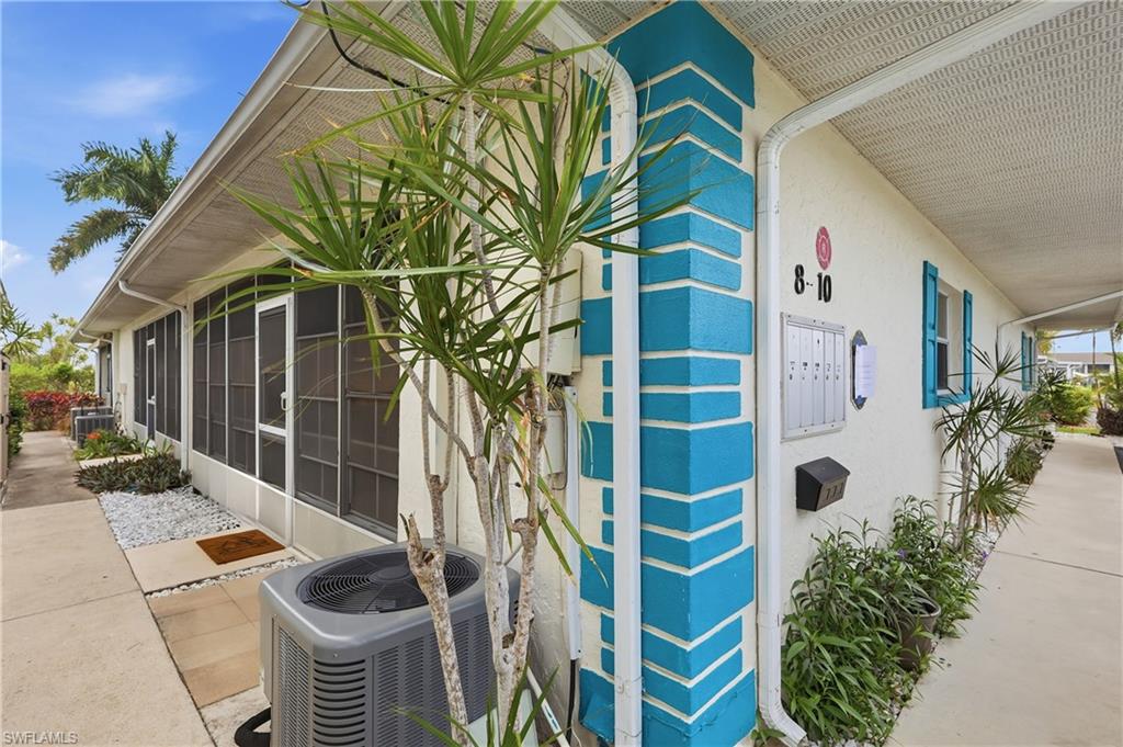 View of property exterior featJust a few hundred yards to the Caloosahatchee River from your Dock. Boating on the cheap. Walk out the back door of the lanai and to the water.