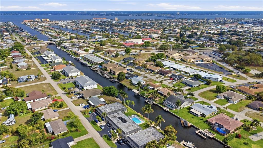 Aerial view of property and surrounding area highlighting views of the Caloosahatchee River