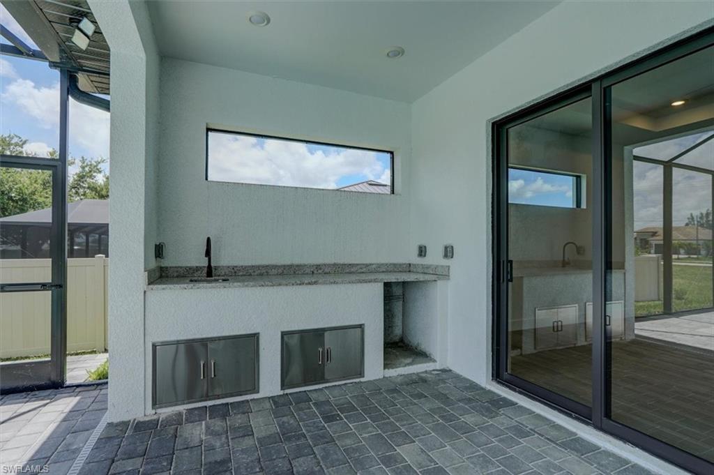 Bathroom featuring sink and tile patterned floors