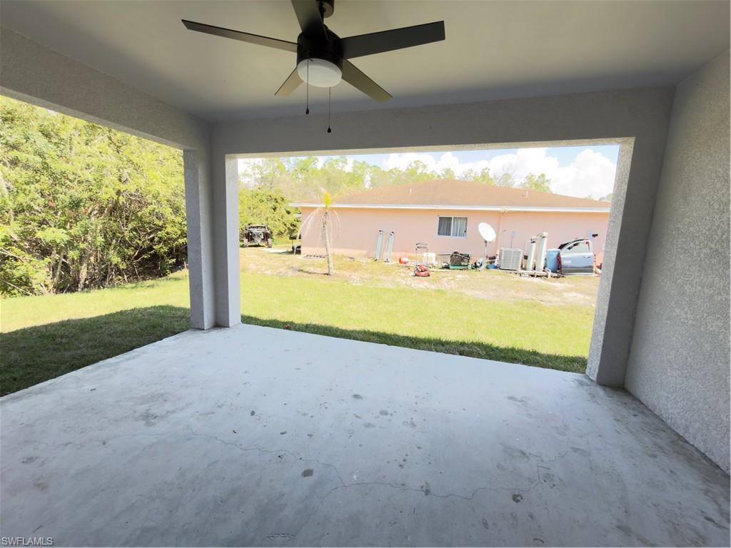 View of patio with a ceiling fan
