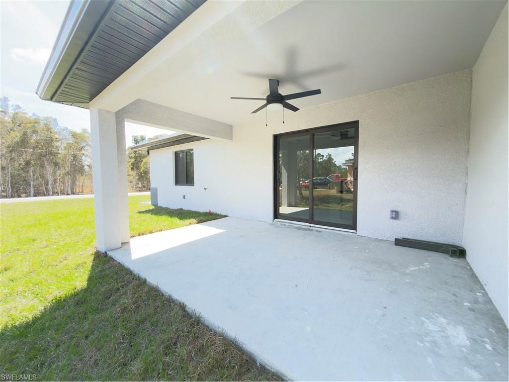 View of patio with ceiling fan