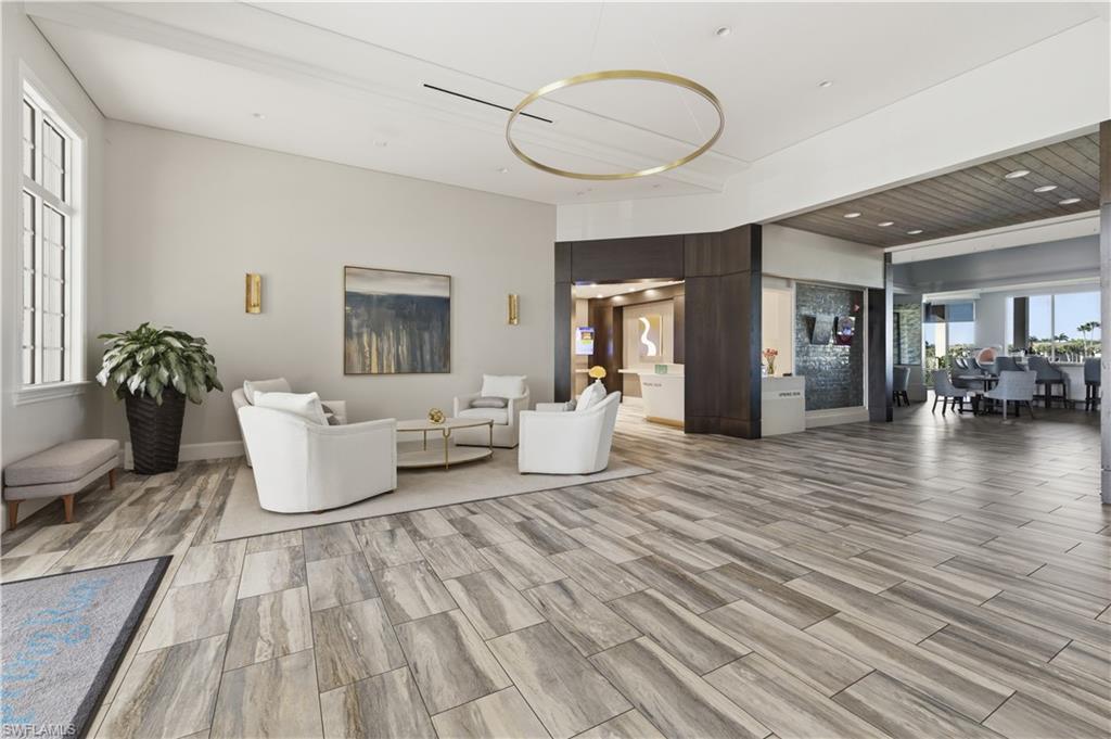 Living area featuring wood tiled floors
