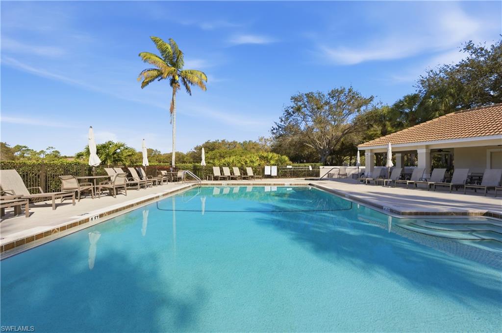 Community pool featuring a patio area