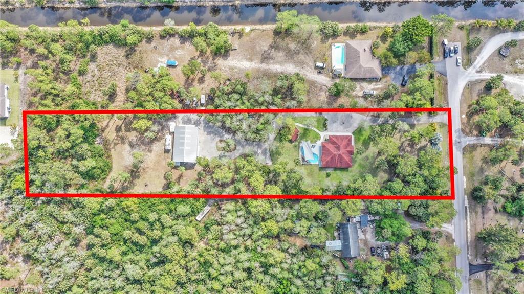 Aerial view of property's location with property parcel outlined