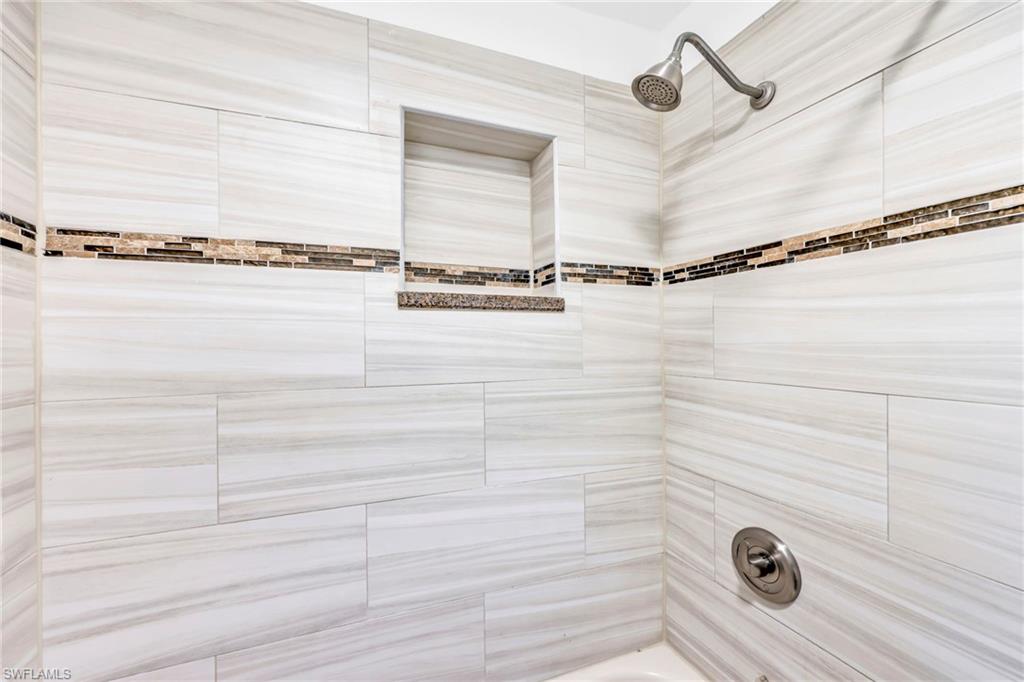 Bathroom featuring tub / shower combination