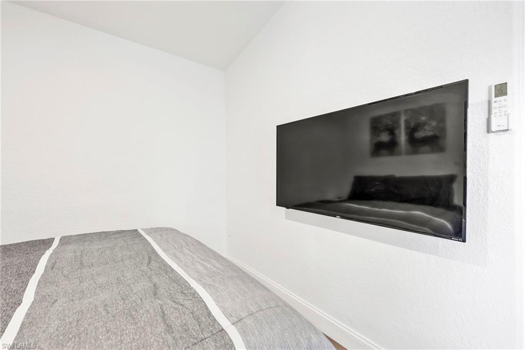 Detailed view of carpet floors and baseboards