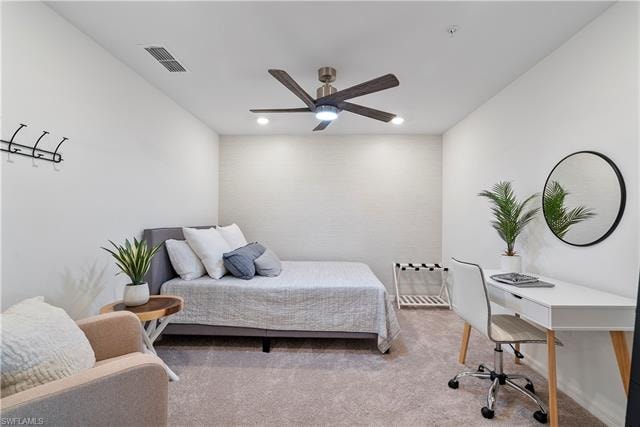 Carpeted bedroom with ceiling fan