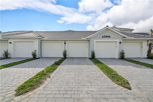 View of front of home featuring a garage
