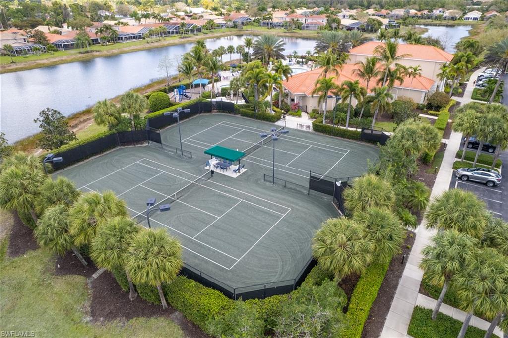 Aerial view of residential area with a large body of water