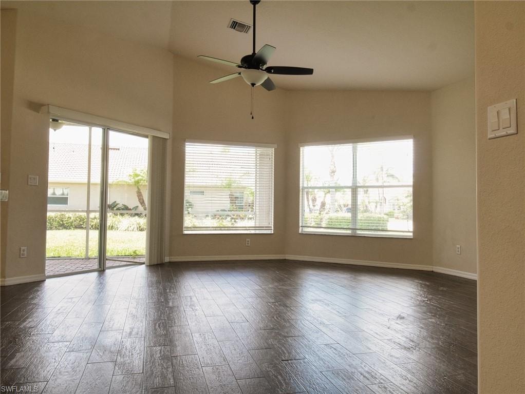 Vaulted ceilings with a ceiling fan overhead