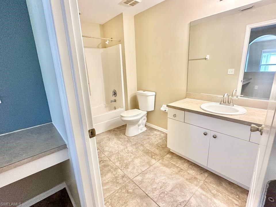 Full bathroom with vanity and shower / bathtub combination