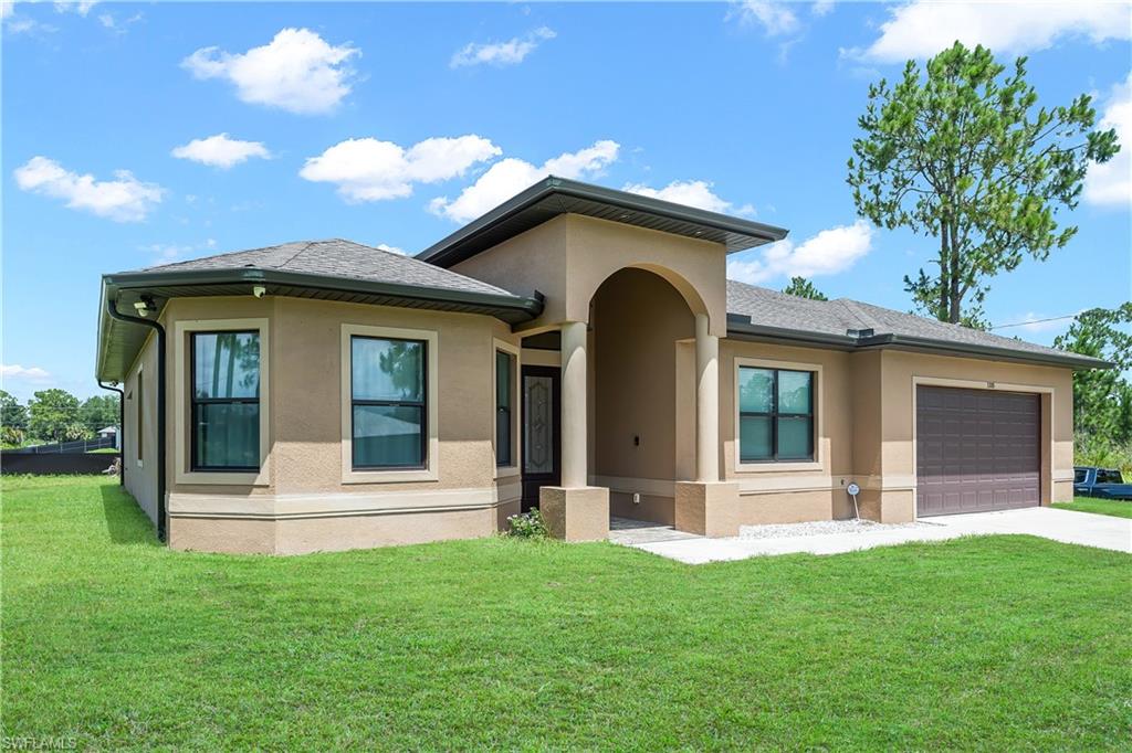 Contemporary stucco exterior with dark trim accents