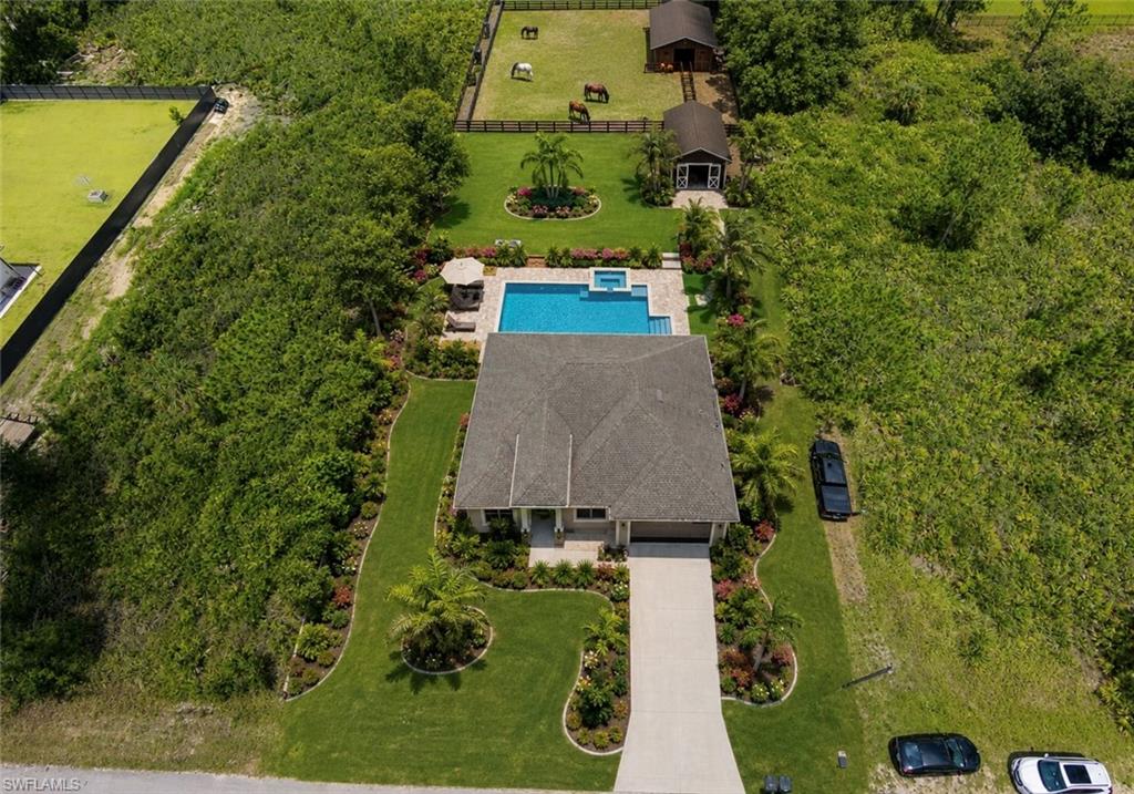 Photos have been virtually enhanced to illustrate the property’s potential. Features shown, including landscaping, pool, and equestrian amenities, are for visualization purposes only and may not exist on the property.