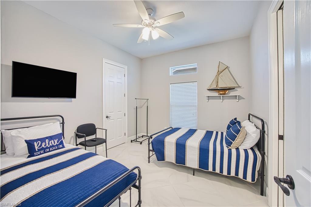 Bedroom featuring a ceiling fan