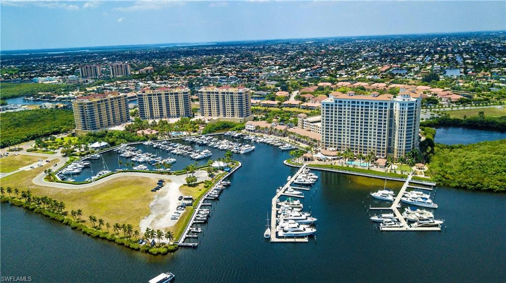 Aerial overview of property's location with a large body of water