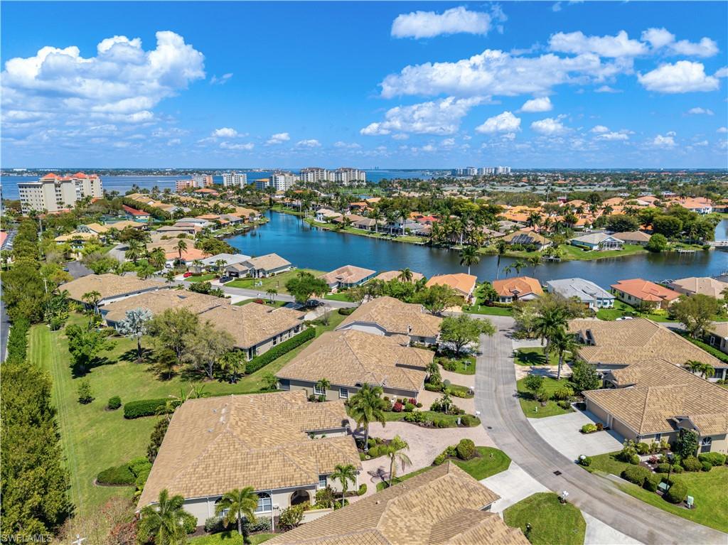 View of urban area featuring a large body of water and nearby suburban area