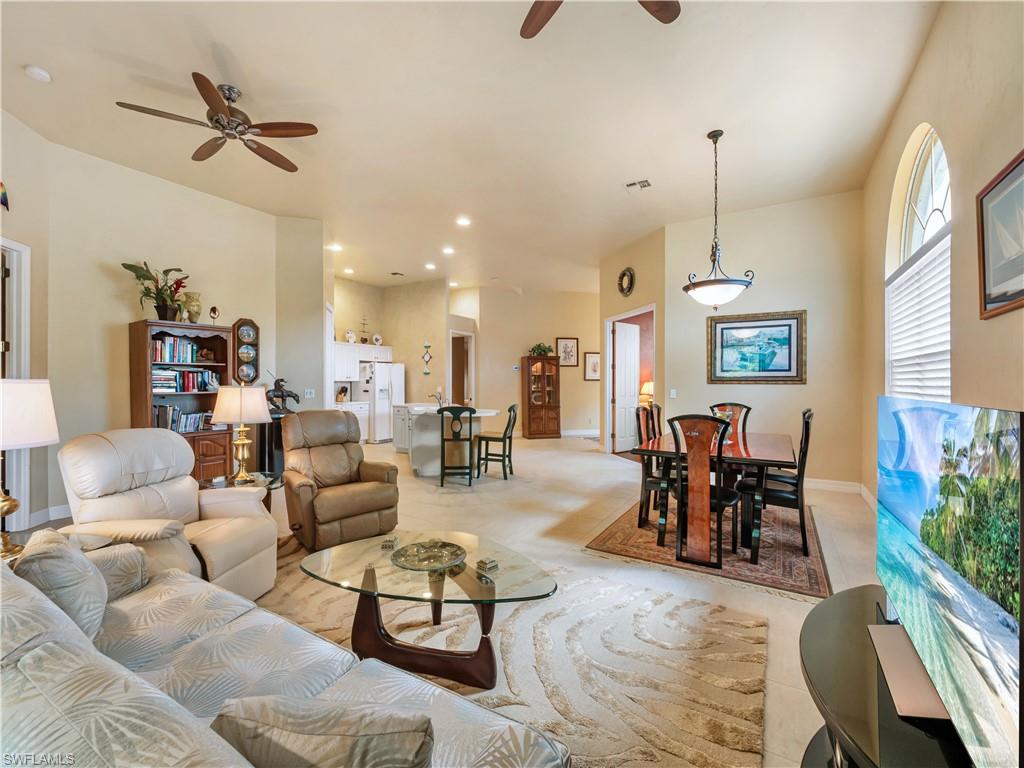 Living area with ceiling fan, and recessed lighting