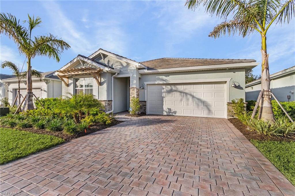 View of front of home featuring a garage