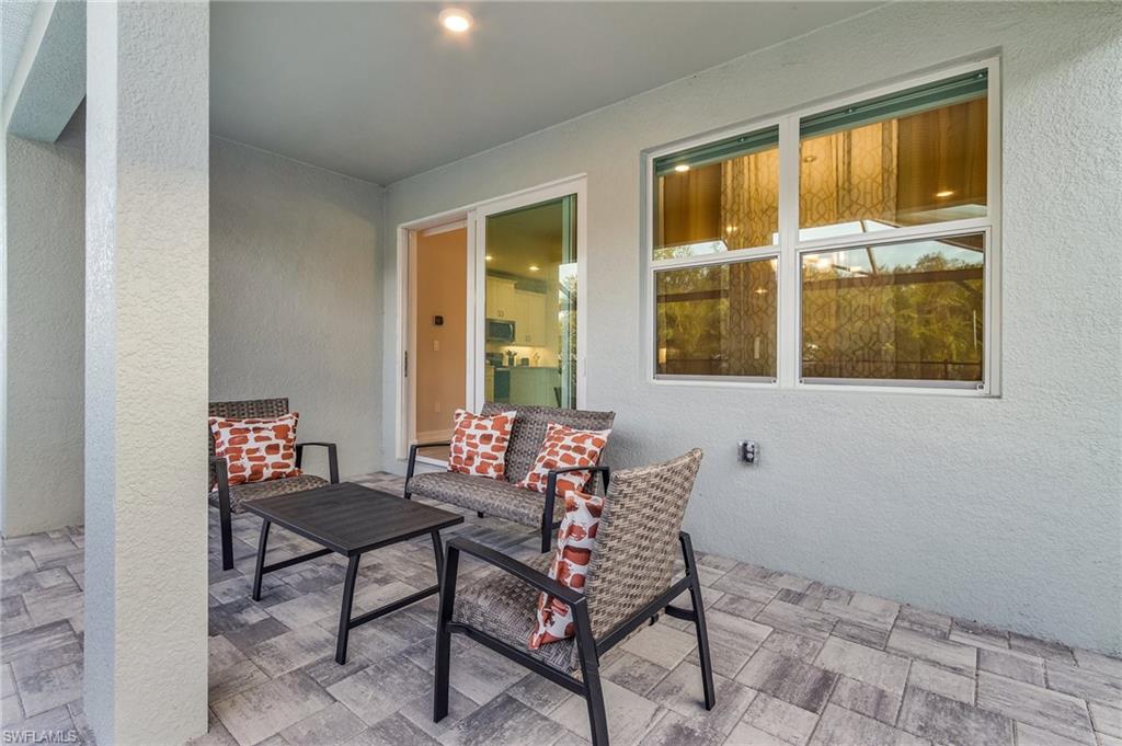 View of patio featuring an outdoor hangout area