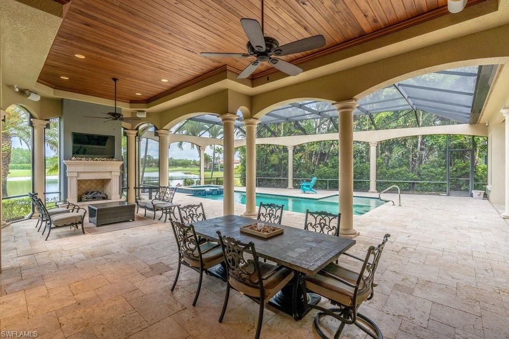 Outdoor dining table, seating area, fireplace