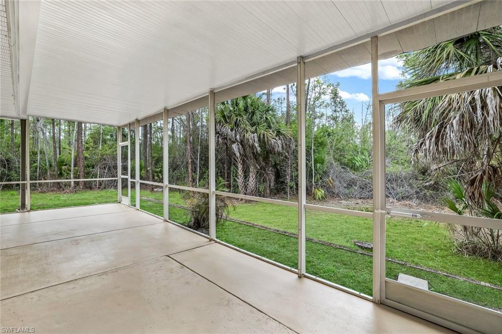 Unfurnished sunroom featuring healthy amount of natural light