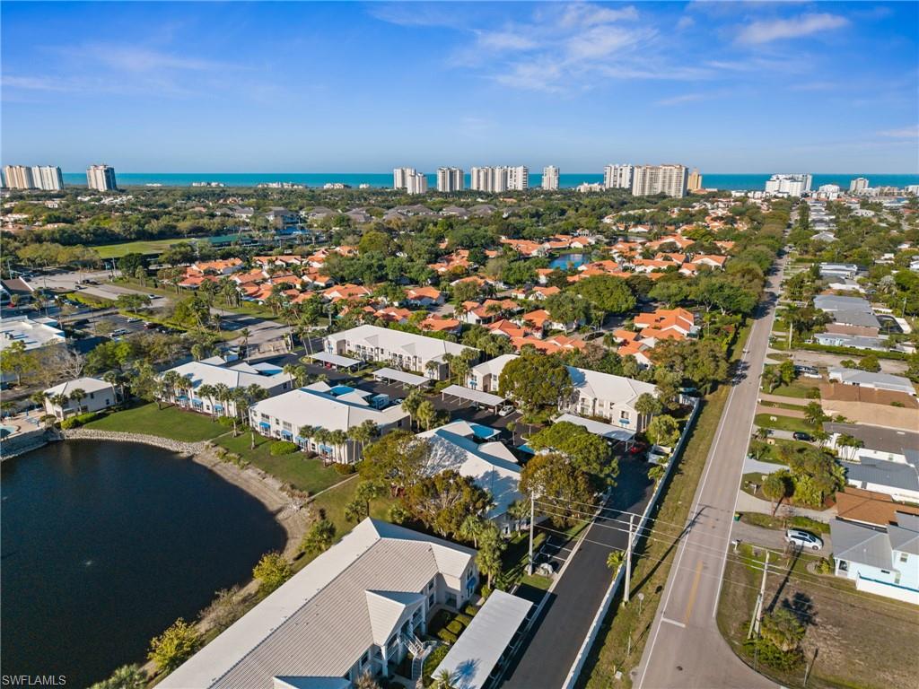 View of urban area featuring a large body of water and nearby suburban area