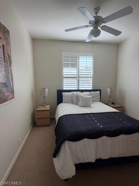 Bedroom featuring carpet flooring and ceiling fan
