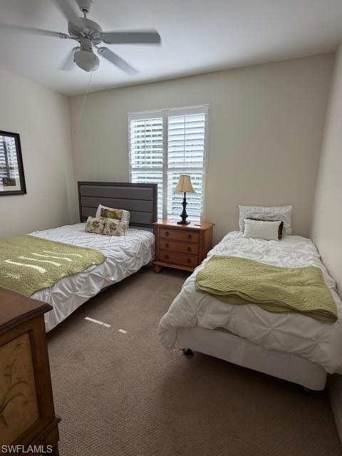 Bedroom with carpet and ceiling fan