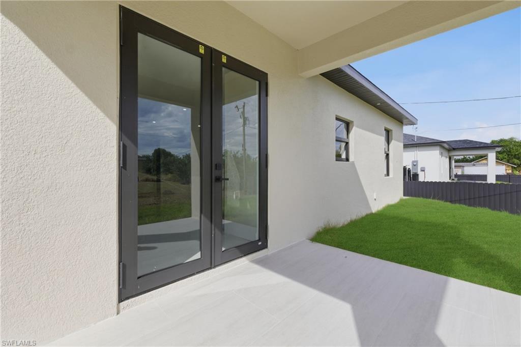 View of patio featuring french doors