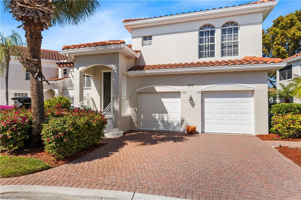 Entry porch and single car garage.